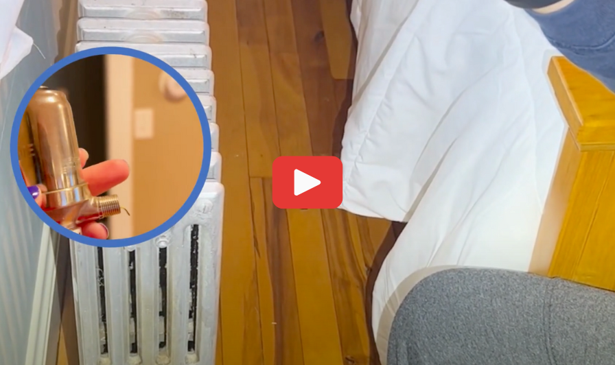 A close up image of a Air Rite Valve being replaced on a hissing steam radiator